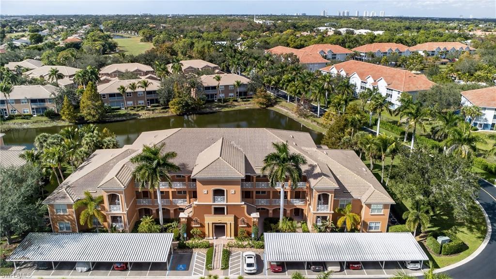 Aerial view of a large body of water and apartment complex