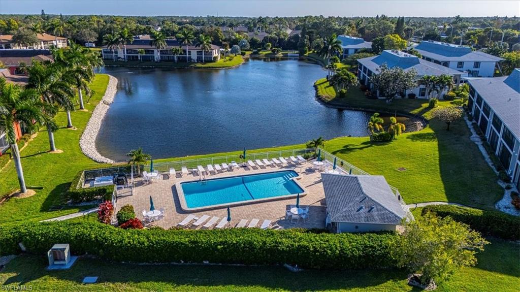 Aerial view of a nearby body of water and a pool
