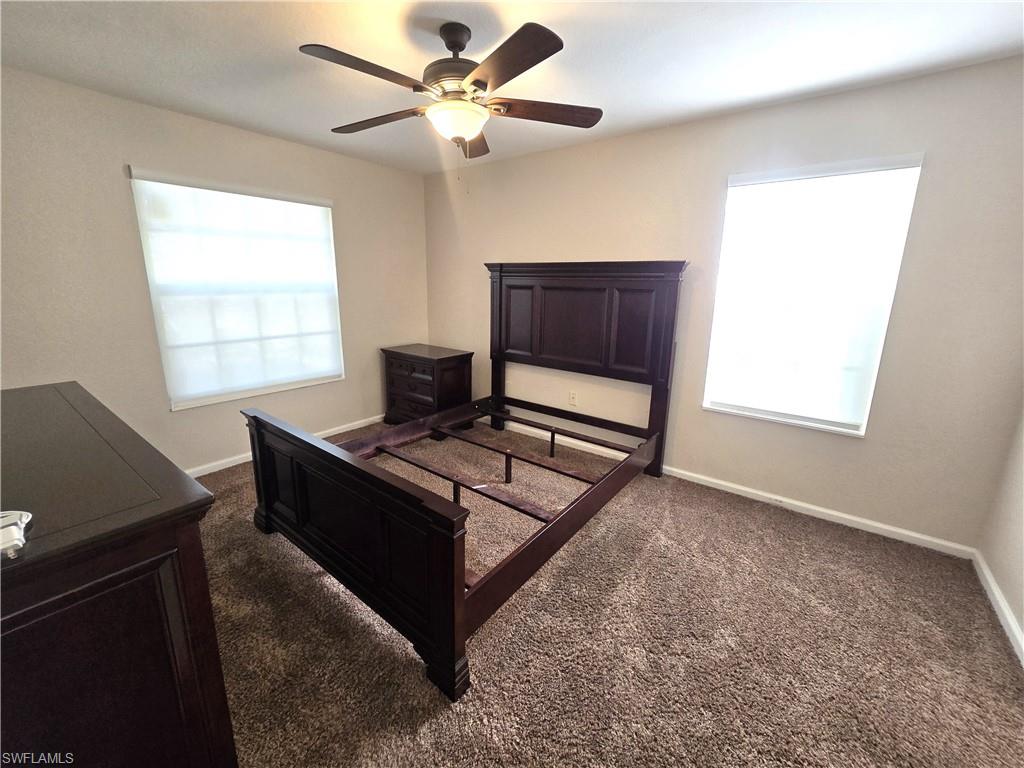 Bed, end table &  dresser left for convenience of buyer. Impact windows, electric blinds.