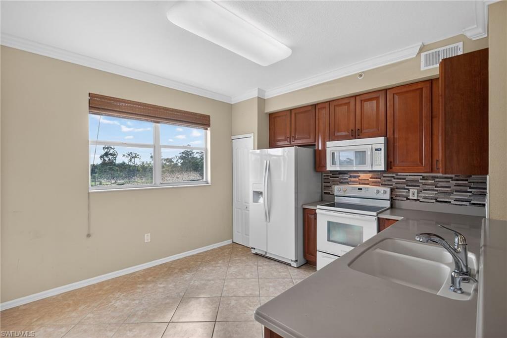 6816 STERLING GREENS PL 303