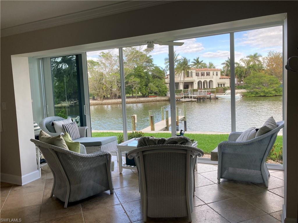 View of patio / terrace with a water view