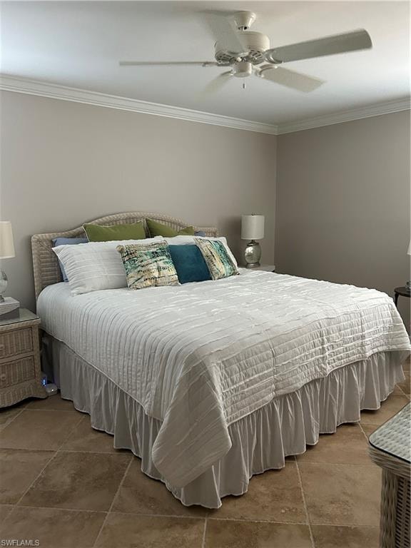 Bedroom with crown molding and ceiling fan