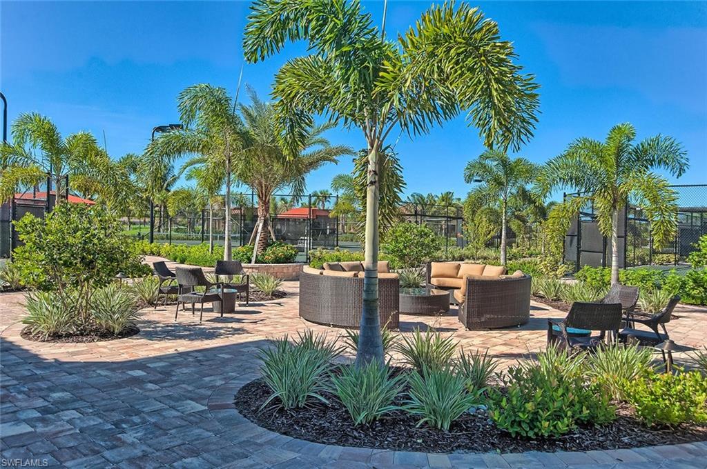 Surrounding community with a patio area and outdoor lounge area