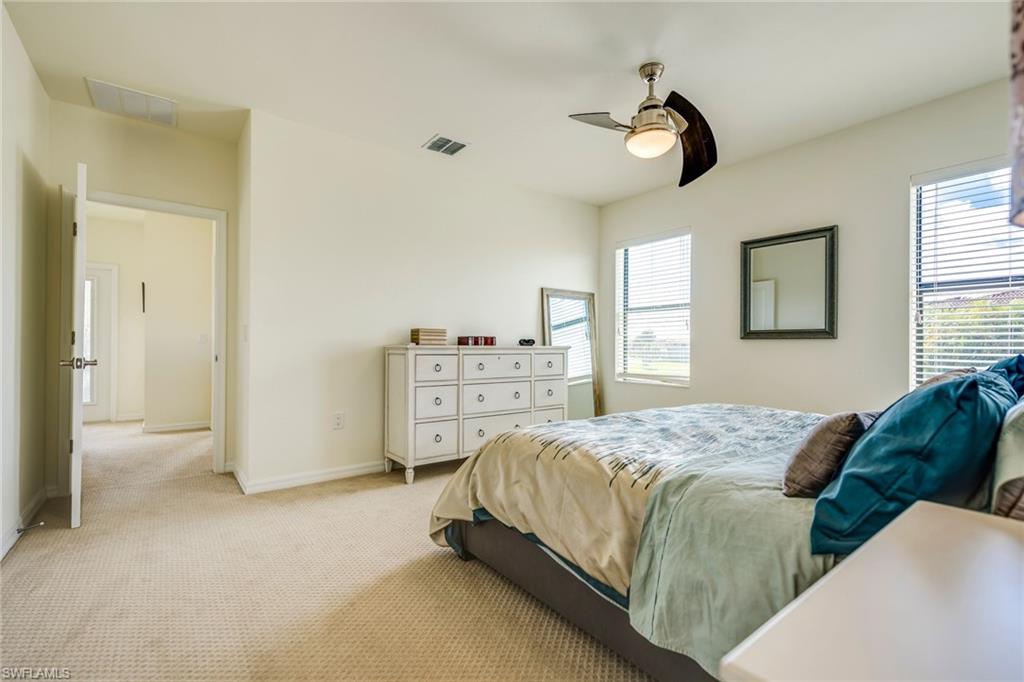 Bedroom with carpet floors and ceiling fan