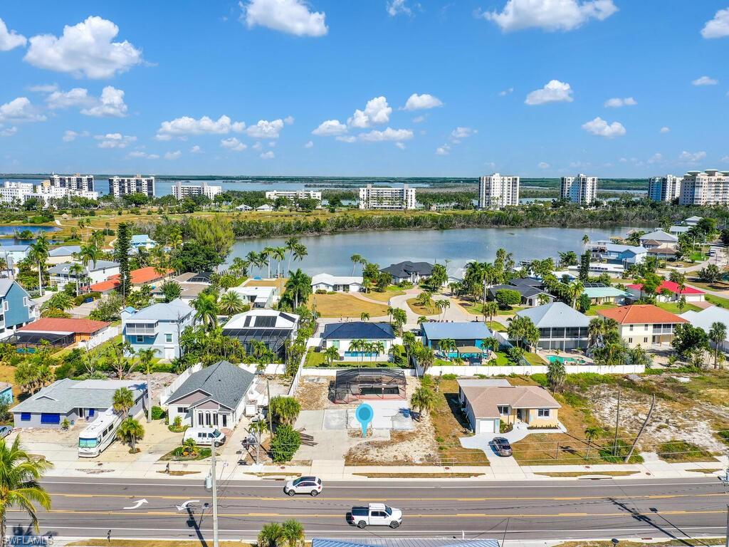 View of urban area with a large body of water and nearby suburban area