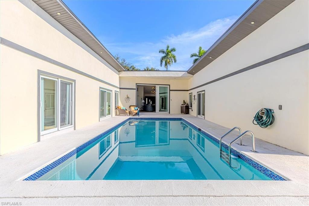 Swimming pool featuring a patio area
