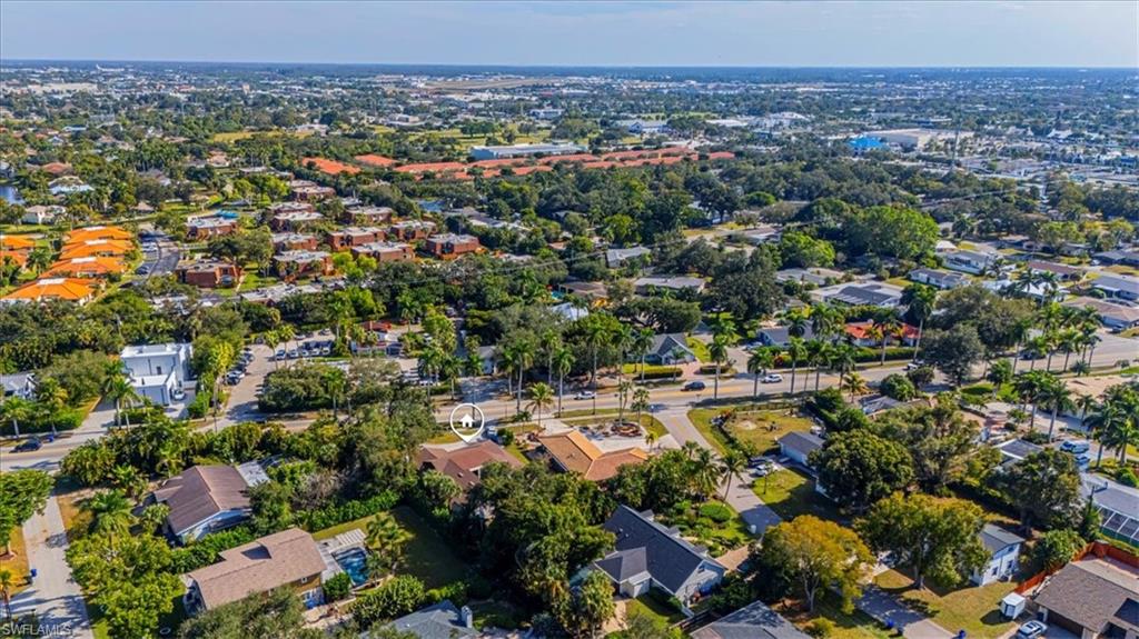 View of property location with nearby suburban area