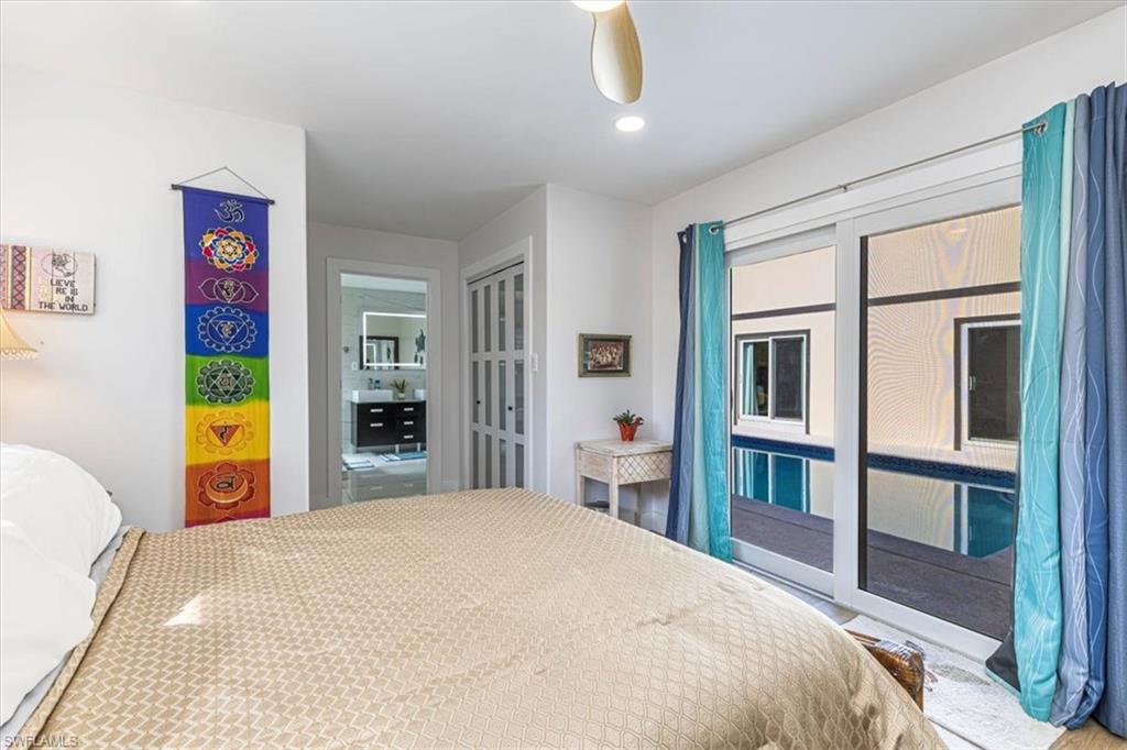 Bedroom with a ceiling fan, a closet, and recessed lighting