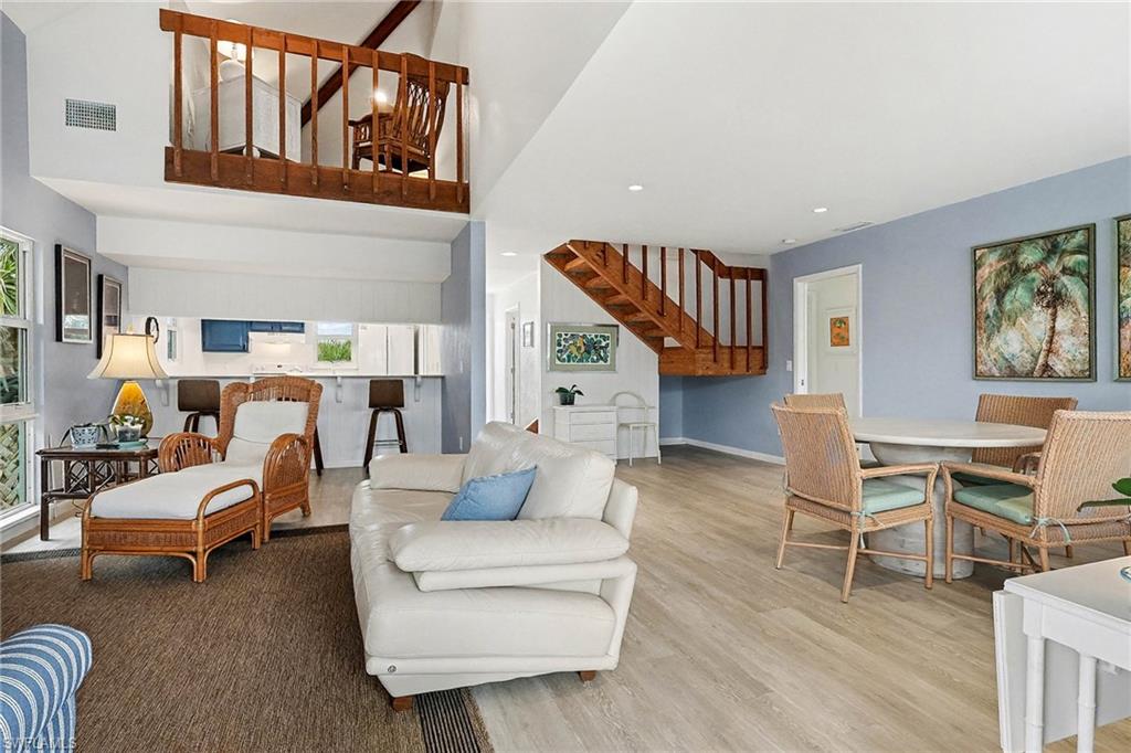 Open concept kitchen, living, and dining