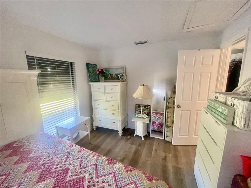 Bedroom featuring dark wood finished floors