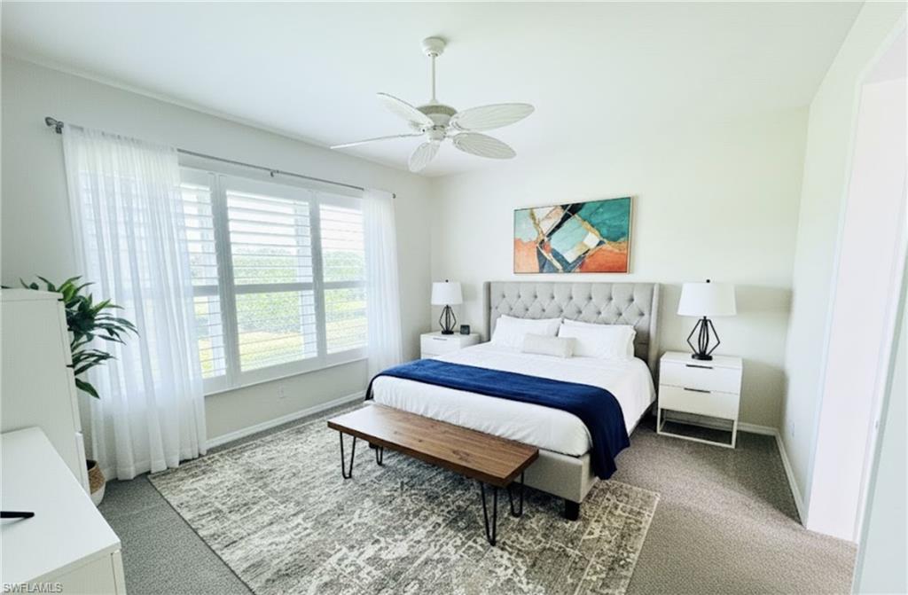 Bedroom featuring carpet floors and a ceiling fan *Photos have been virtually staged for perspective.