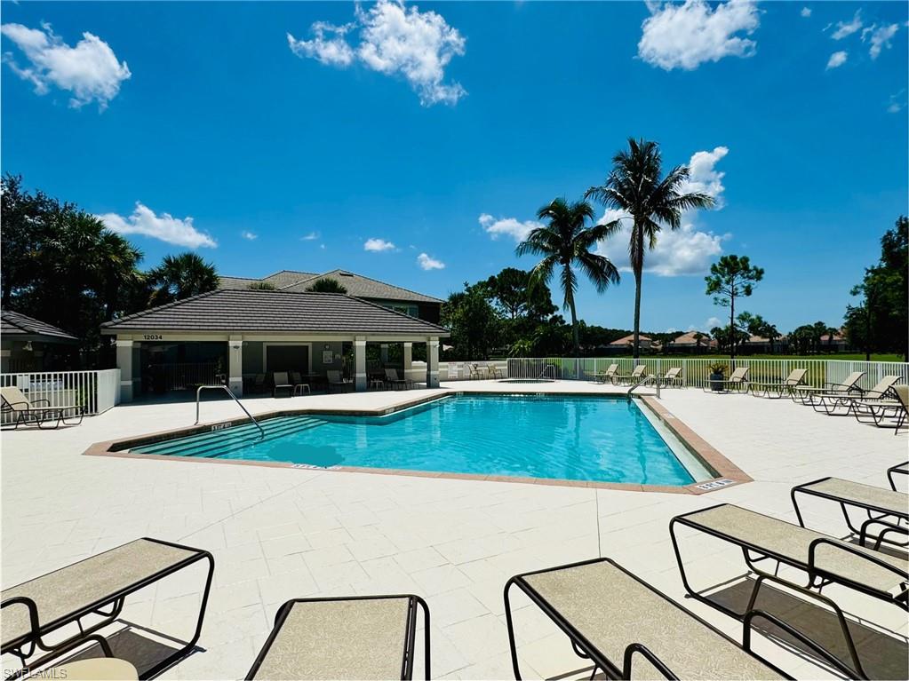 Community pool with a patio area