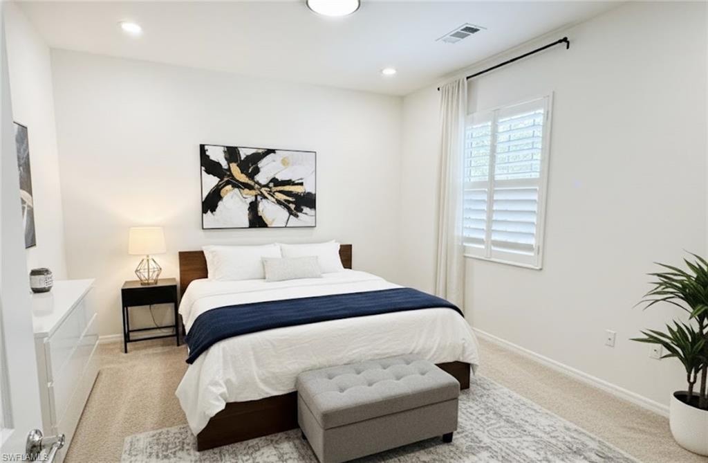 Bedroom with carpet floors and recessed *Photos have been virtually staged for perspective.lighting