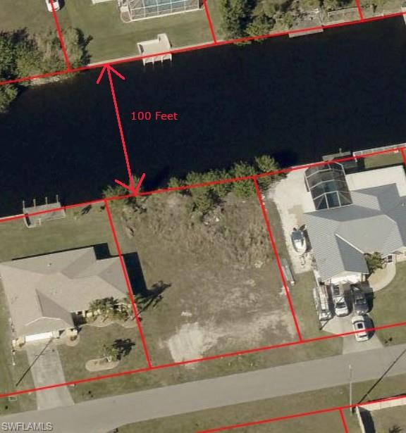 Aerial view of property's location featuring property parcel outlined