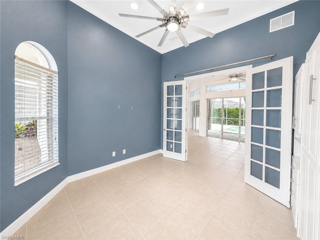 Office featuring high vaulted ceilings, a contemporary ceiling fan, and ceramic tile flooring