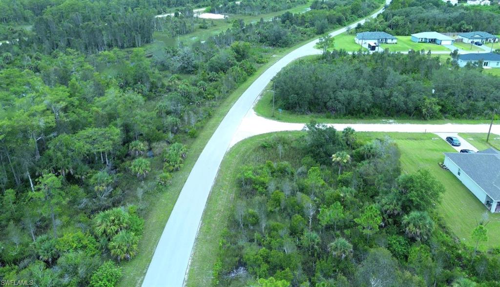 Aerial overview of property's location with a forest