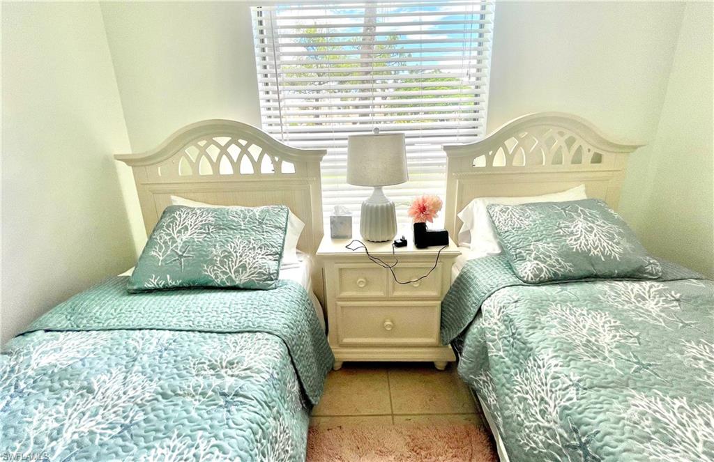 Bedroom featuring tile patterned flooring