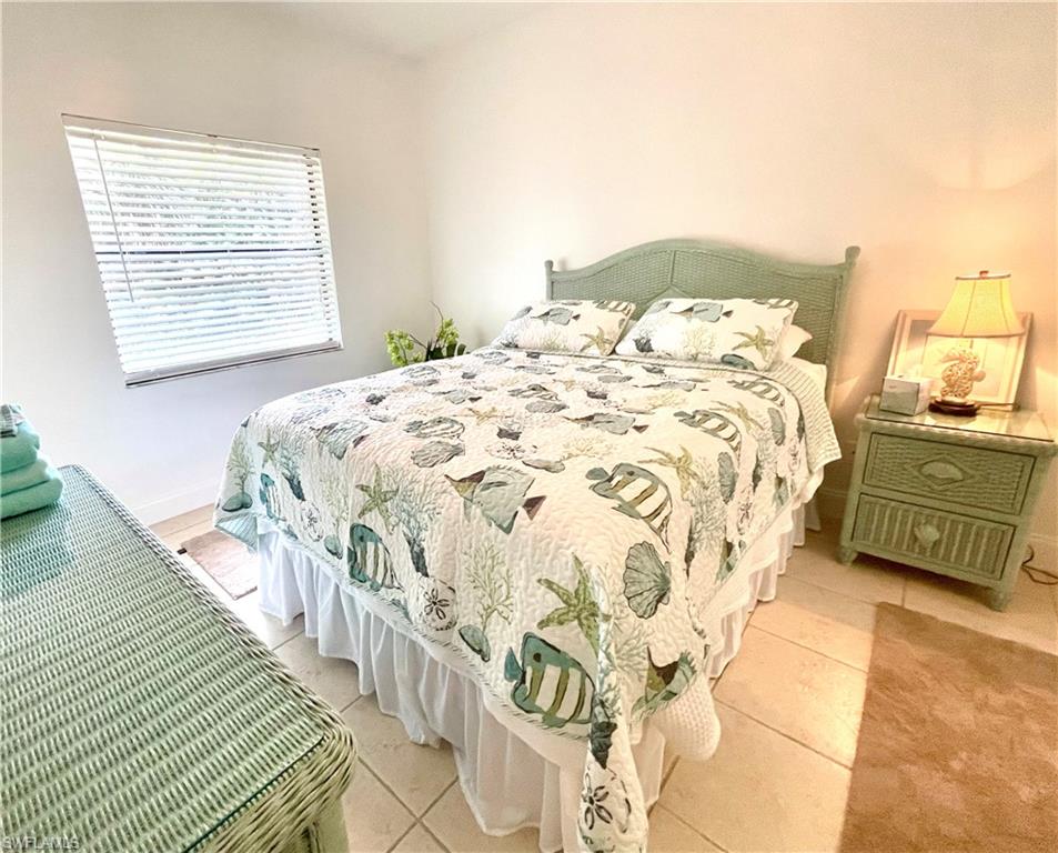 Bedroom featuring light tile patterned floors