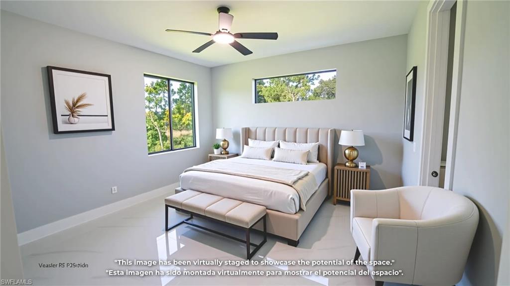 Bedroom featuring radiator heating unit and a ceiling fan