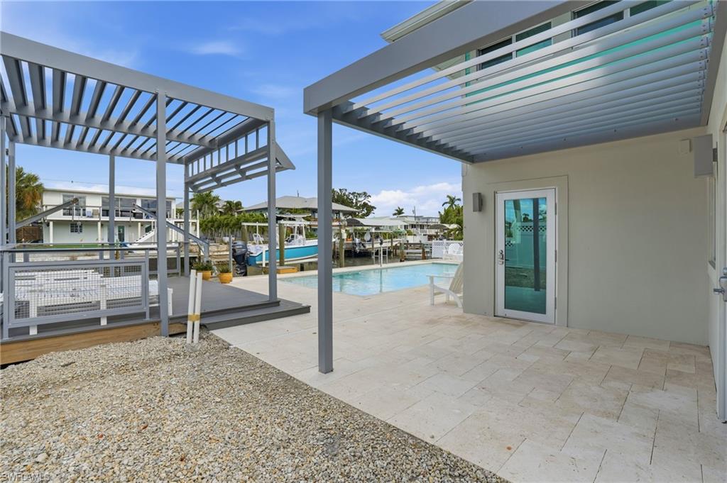 View of patio / terrace with a pergola - Virtually Edited Image
