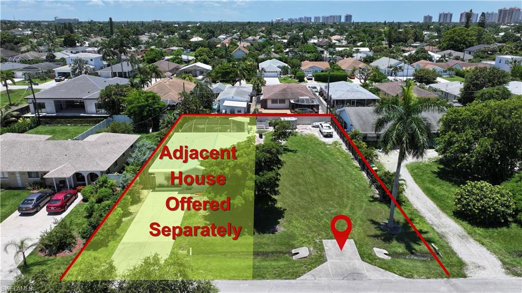 Expansive undeveloped lot featuring a defined property boundary and direct road frontage