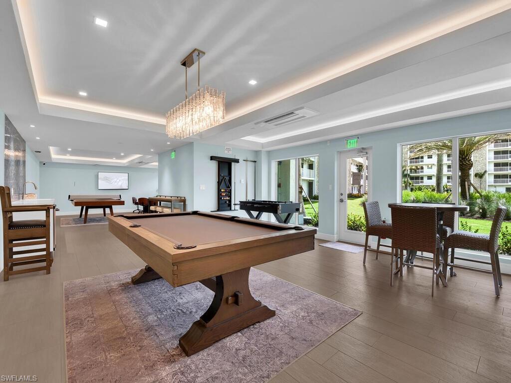 Playroom with pool table, recessed lighting, and cooling unit