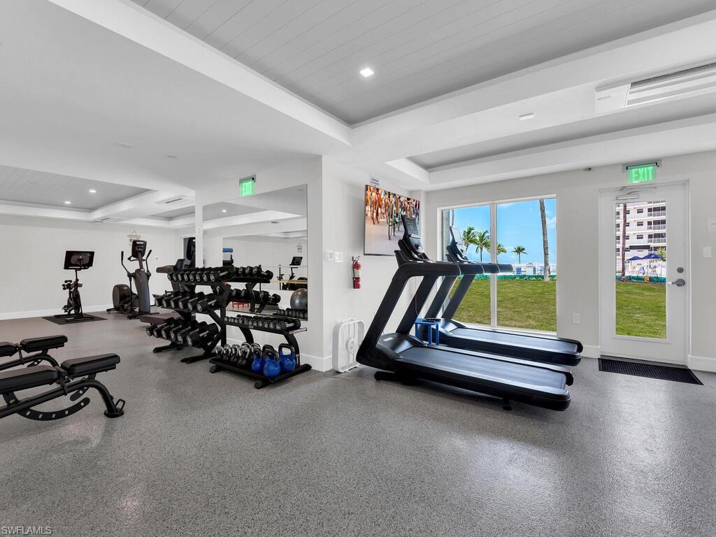 Exercise room featuring wooden ceiling