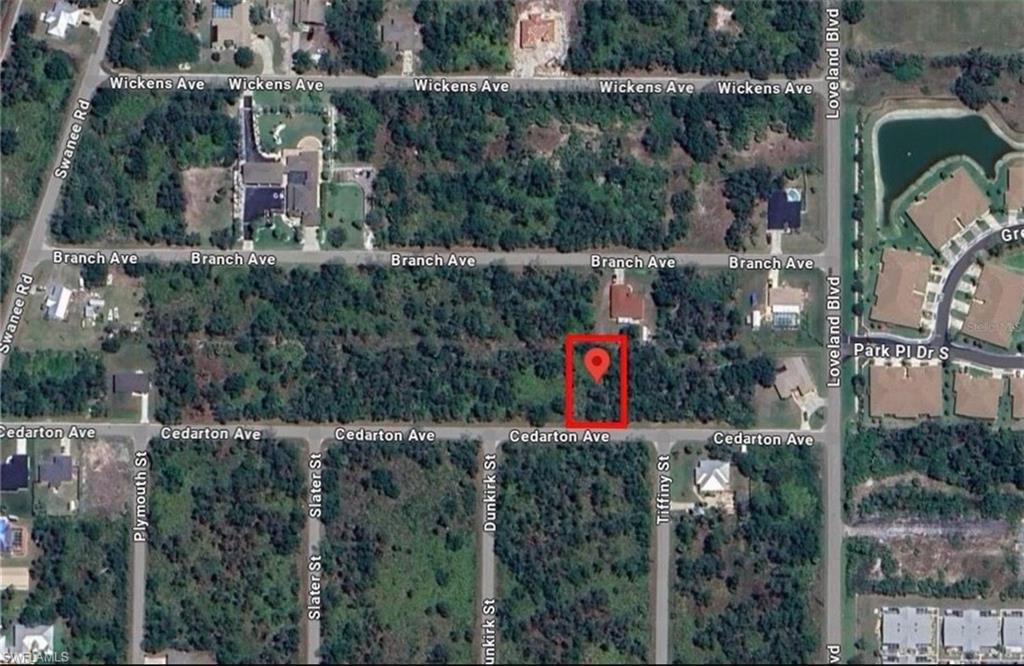 Aerial view of property's location featuring property parcel outlined