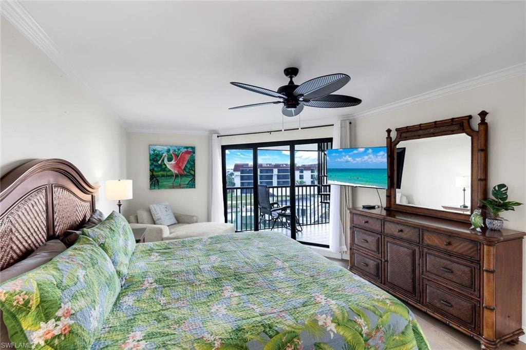 Bedroom with crown molding, access to outside, and ceiling fan