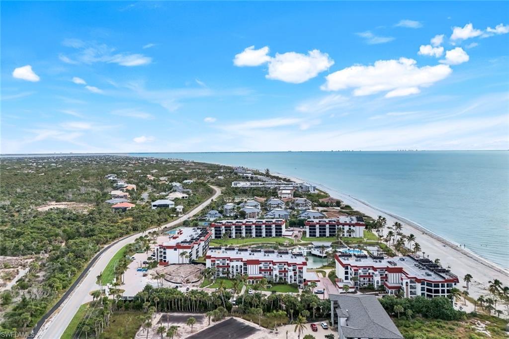 Bird's eye view of waterfront with a beach