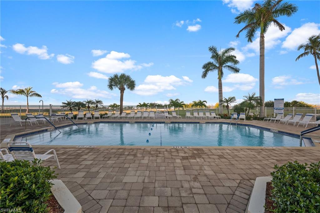 Community pool with a patio area