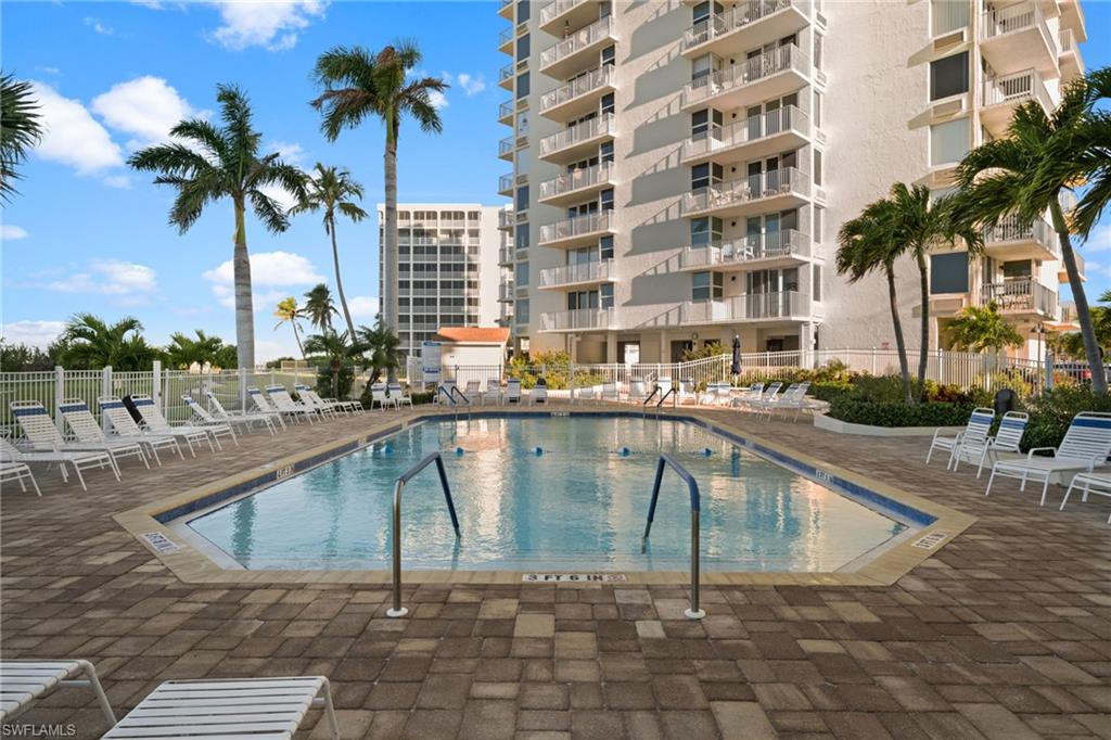 Community pool with a patio area