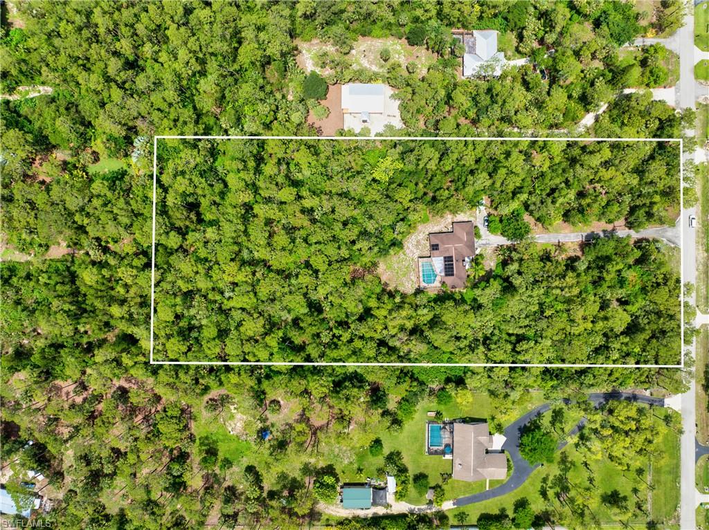Aerial overview of property's location with property parcel outlined