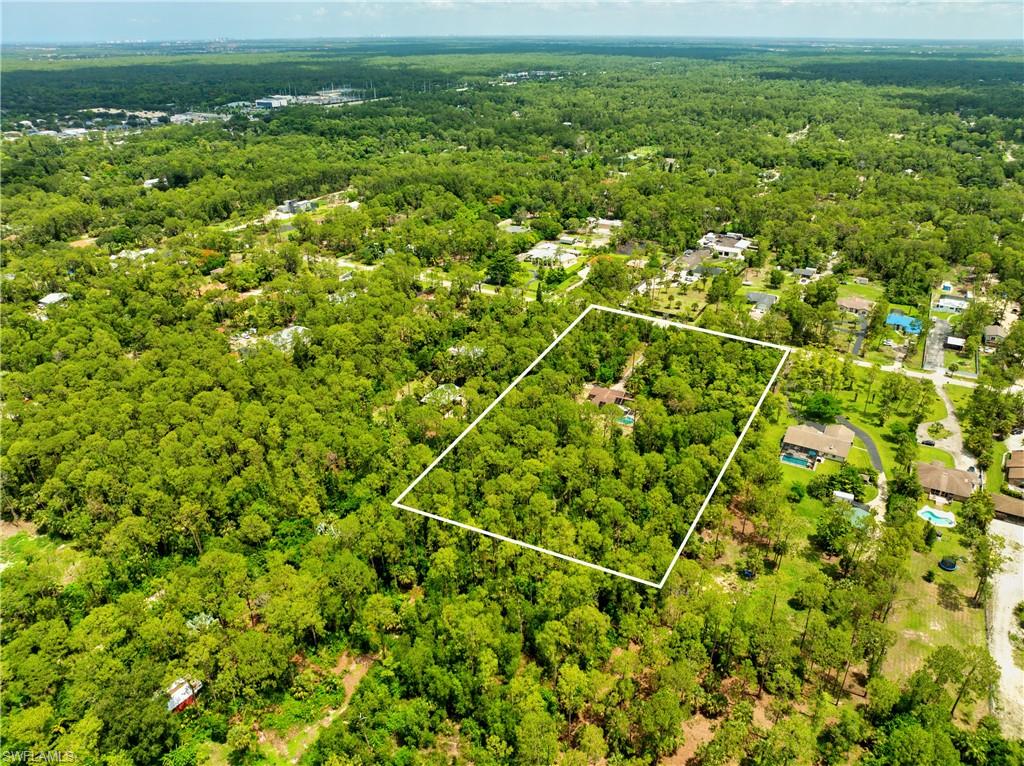Aerial view of property's location with property parcel outlined