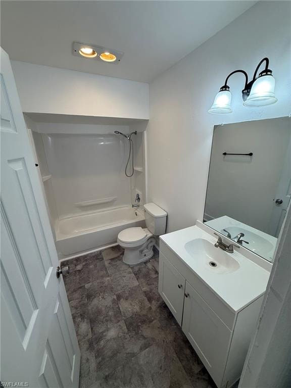 Bathroom featuring vanity and shower / tub combination