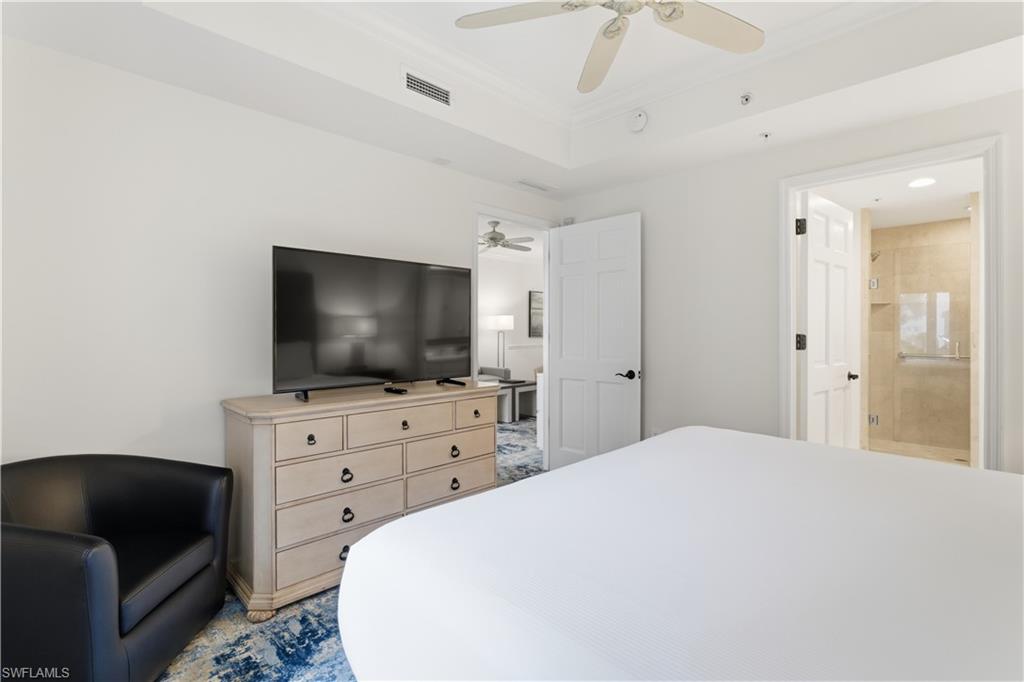 Bedroom featuring ornamental molding and ceiling fan