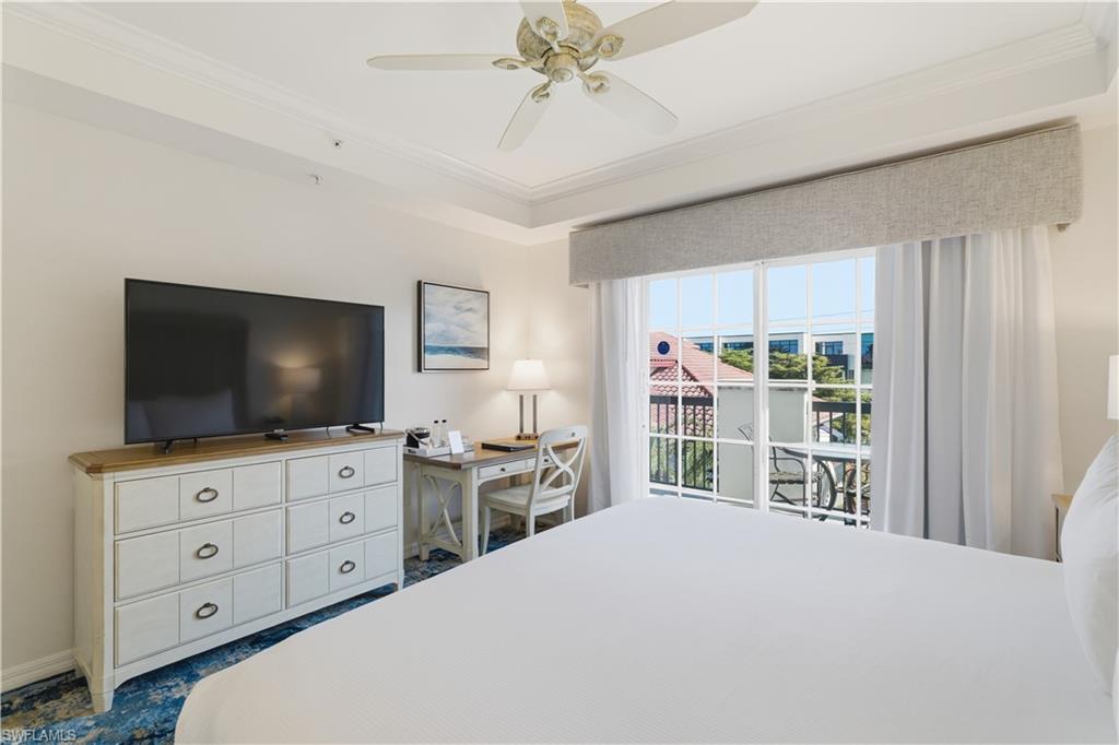 Bedroom featuring ornamental molding and a ceiling fan