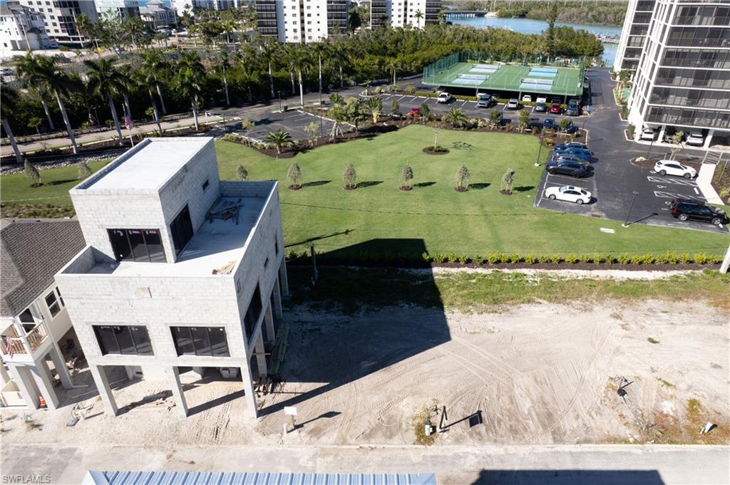 Lot #36, next to home being built with landscaped views out the back of the property.