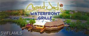 Walk, bike, or boat to fine dining at Coconut Jacks!