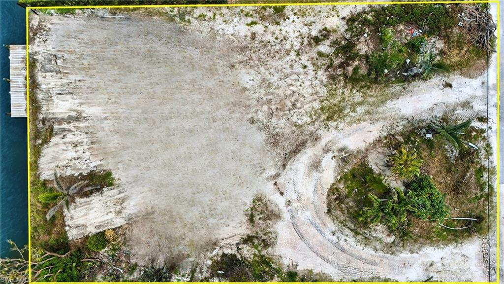 Aerial view with property parcel outlined - Virtually Edited Image