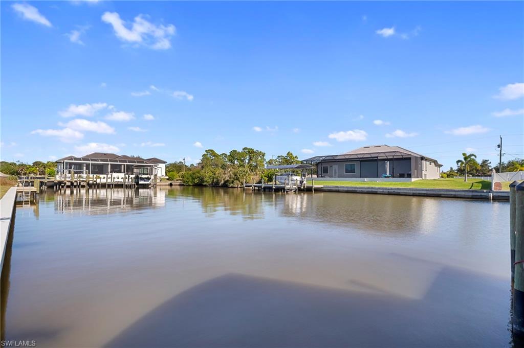 Water view featuring a dock
