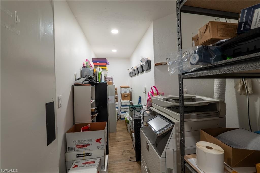 Kitchen featuring light wood-type flooring and recessed lighting