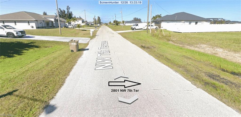 View of property looking up street.