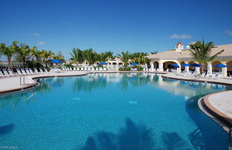 Community pool featuring a patio