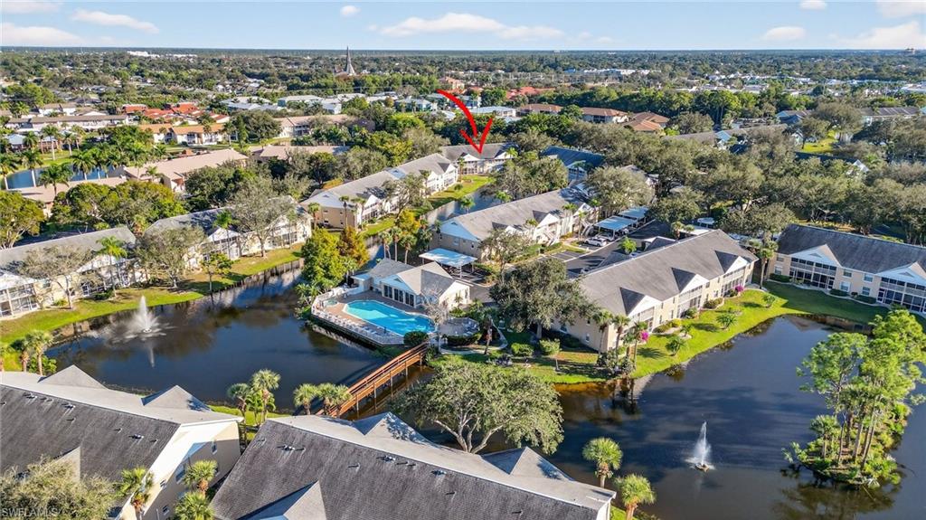 Aerial view of residential area with a nearby body of water