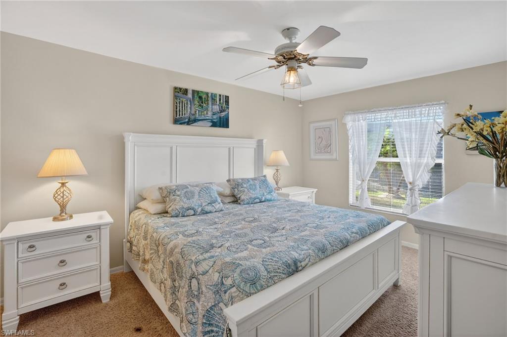 Bedroom featuring carpet flooring and ceiling fan
