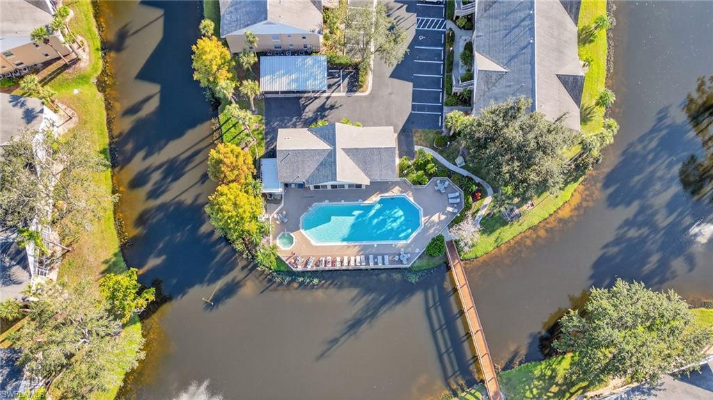 Bird's eye view of a large body of water and a pool area