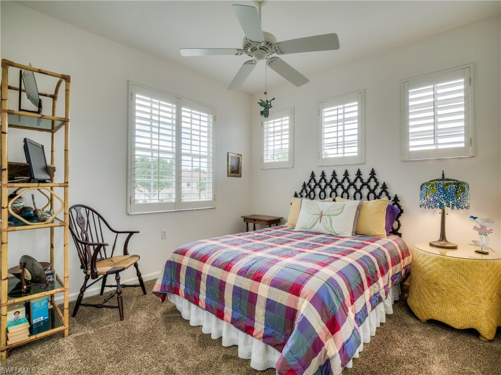 Bedroom with carpet flooring and ceiling fan