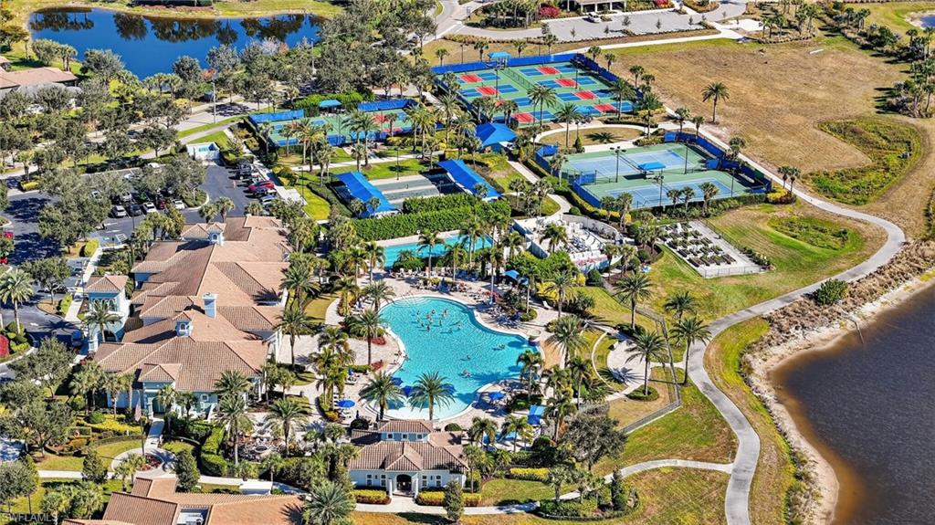 Aerial view of a nearby body of water and a pool area