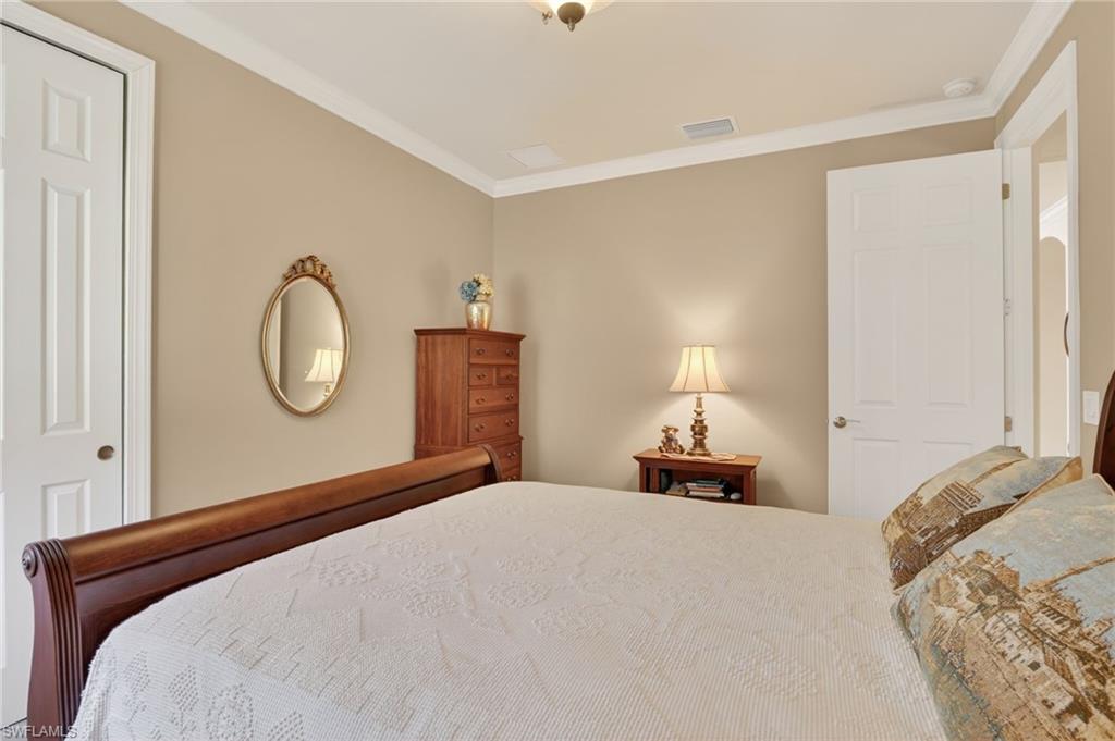 Bedroom with crown molding